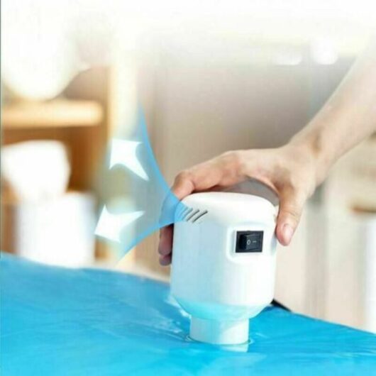 Electric Vacuum Pump for Storing Clothes at Home and While Traveling, Provides Optimal Sealing for Storage Bags.